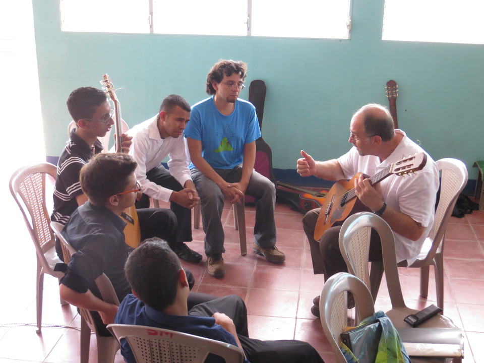 michael with guitar students